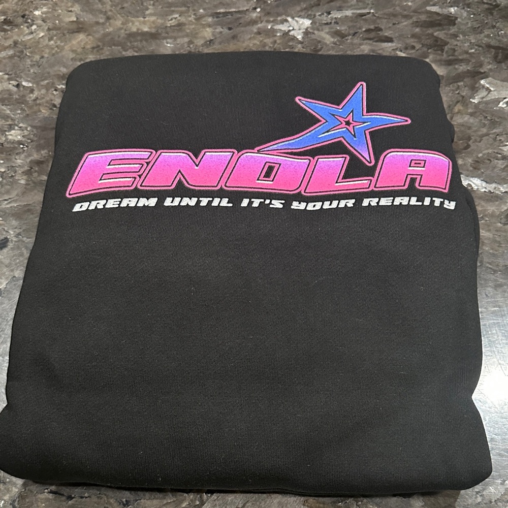 Enola Black Sweatshirt with Pink and Blue Star Graphic